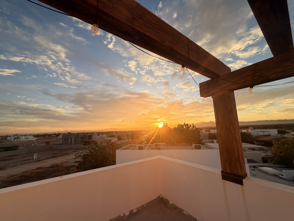 Rooftop pergola at last light